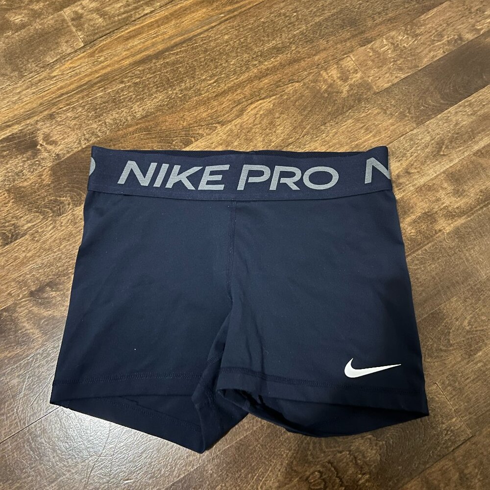 Blue Nike pro shorts